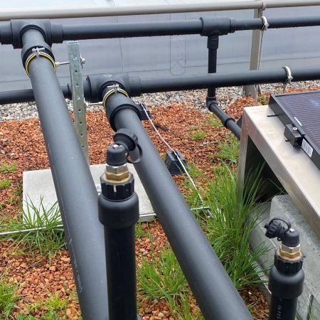 PVT Flat Roof System Piping Closeup Arlesheim Clinic Copyright SOLTOP Energie AG